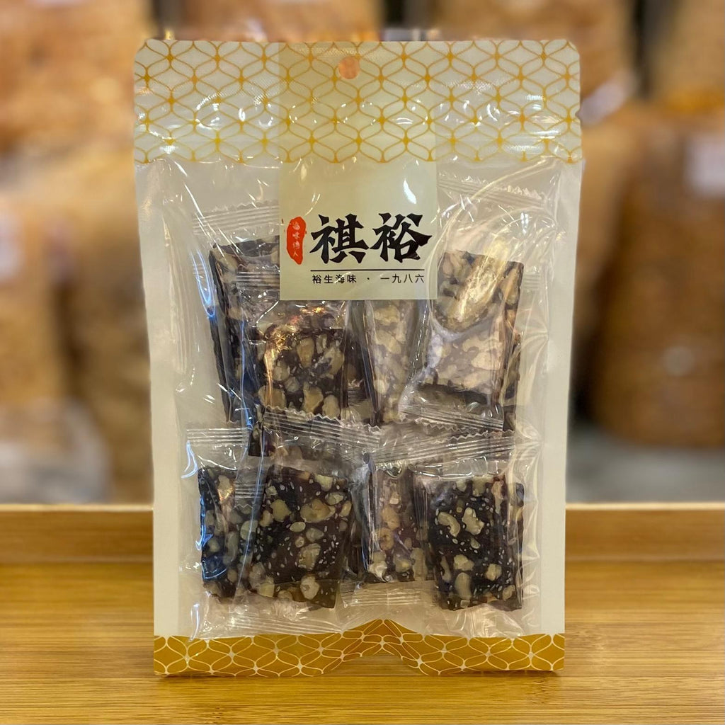 Black Date & Macadamia Cake